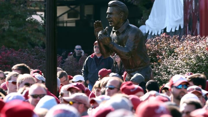 Nov 15, 2014; Tuscaloosa, AL, USA; Alabama Crimson Tide fans gather outside Bryant-Denny Stadium near the Nick Saban statue prior to facing the Mississippi State Bulldogs. Mandatory Credit: Marvin Gentry-USA TODAY Sports