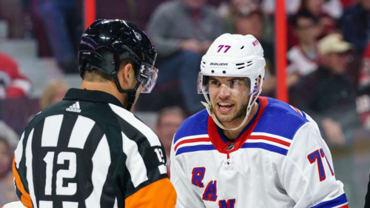 OTTAWA, ON - OCTOBER 5: Tony DeAngelo #77 of the New York Rangers has words with referee Justin St. Pierre #12 after a scrum in a game the Ottawa Senators at Canadian Tire Centre on October 5, 2019 in Ottawa, Ontario, Canada. (Photo by Jana Chytilova/Freestyle Photography/Getty Images)