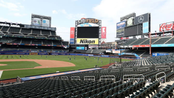 NEW YORK, NEW YORK - JULY 03: The New York Mets train on the field as the stands remain empty during Major League Baseball Summer Training restart at Citi Field on July 03, 2020 in New York City. (Photo by Al Bello/Getty Images)