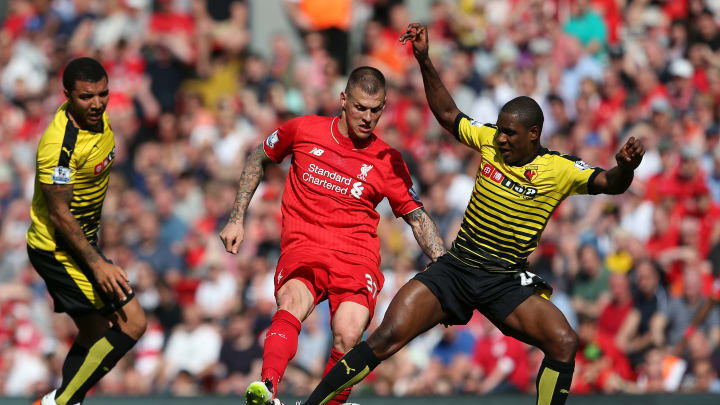 LIVERPOOL, ENGLAND – MAY 08: Martin Skrtel of Liverpool battles for the ball with Odion Ighalo of Watford during the Barclays Premier League match between Liverpool and Watford at Anfield on May 8, 2016 in Liverpool, England. (Photo by Jan Kruger/Getty Images)