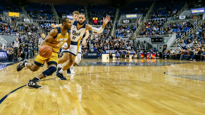 RENO, NEVADA - NOVEMBER 19: Milan Acquaah #0 of the California Baptist Lancers drives to the basket durign the second half against the Nevada Wolf Pack at Lawlor Events Center on November 19, 2018 in Reno, Nevada. (Photo by Jonathan Devich/Getty Images)