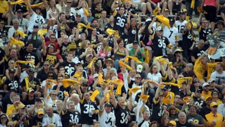 Aug 8, 2015; Canton, OH, USA; Pittsburgh Steelers fans wave Terrible Towels during the 2015 Pro Football Hall of Fame enshrinement at Tom Benson Hall of Fame Stadium. Mandatory Credit: Kirby Lee-USA TODAY Sports