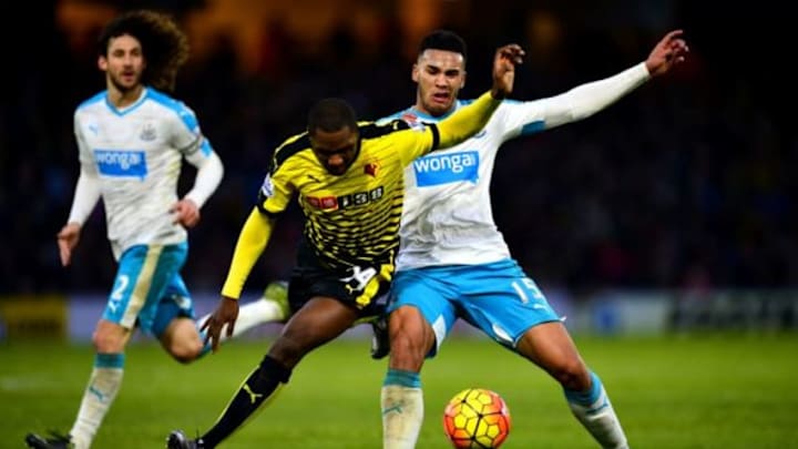WATFORD, ENGLAND - JANUARY 23: Odion Ighalo of Watford and Jamaal Lascelles of Newcastle United compete for the ball during the Barclays Premier League match between Watford and Newcastle United at Vicarage Road on January 23, 2016 in Watford, England (Photo by Dan Mullan/Getty Images)