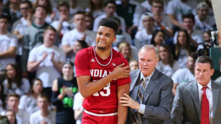 EAST LANSING, MI – FEBRUARY 02: Juwan Morgan #13 of the Indiana Hoosiers is help off the court in the first half during a game against the Michigan State Spartan at Breslin Center on February 2, 2019 in East Lansing, Michigan. (Photo by Rey Del Rio/Getty Images)