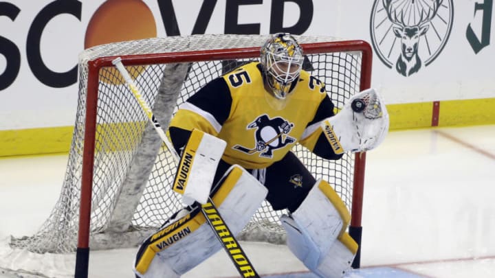 May 16, 2021; Pittsburgh, Pennsylvania, USA; Pittsburgh Penguins goaltender Tristan Jarry (35) warms up before playing the New York Islanders in game one of the first round of the 2021 Stanley Cup Playoffs at PPG Paints Arena. Mandatory Credit: Charles LeClaire-USA TODAY Sports