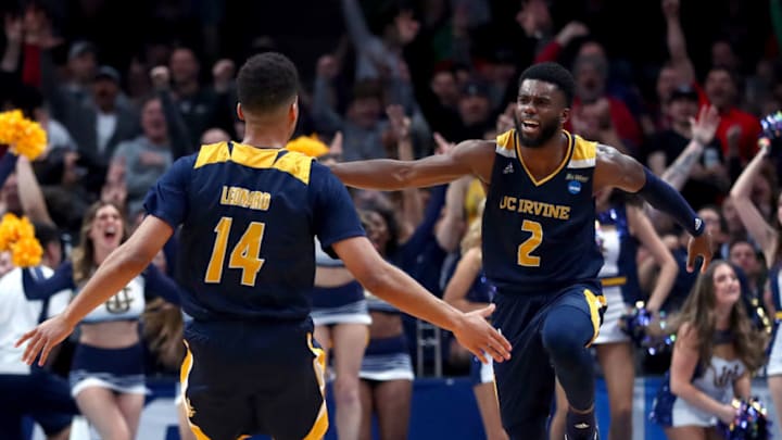 SAN JOSE, CALIFORNIA - MARCH 22: Evan Leonard #14 of the UC Irvine Anteaters celebrates a three-point shot with Max Hazzard #2 in the second half against the Kansas State Wildcats during the first round of the 2019 NCAA Men's Basketball Tournament at SAP Center on March 22, 2019 in San Jose, California. (Photo by Yong Teck Lim/Getty Images)