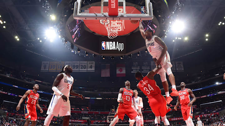 LOS ANGELES, CA – APRIL 9: Sindarius Thornwell #0 of the LA Clippers goes up for a dunk against the New Orleans Pelicans on April 9, 2018 at STAPLES Center in Los Angeles, California. NOTE TO USER: User expressly acknowledges and agrees that, by downloading and/or using this Photograph, user is consenting to the terms and conditions of the Getty Images License Agreement. Mandatory Copyright Notice: Copyright 2018 NBAE (Photo by Andrew D. Bernstein/NBAE via Getty Images)