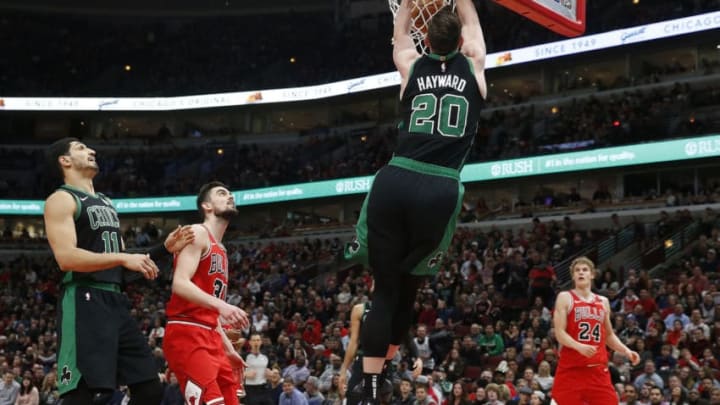 CHICAGO, ILLINOIS - JANUARY 04: Gordon Hayward #20 of the Boston Celtics dunks in front of Tomas Satoransky #31 of the Chicago Bulls during the second half at United Center on January 04, 2020 in Chicago, Illinois. NOTE TO USER: User expressly acknowledges and agrees that, by downloading and or using this photograph, User is consenting to the terms and conditions of the Getty Images License Agreement. (Photo by Nuccio DiNuzzo/Getty Images)