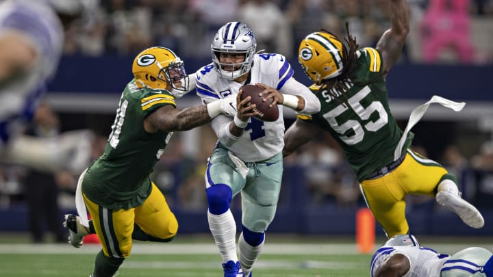 ARLINGTON, TX – OCTOBER 6: Dak Prescott #4 of the Dallas Cowboys tries to run the ball but is sacked by Preston Smith #91 of the Green Bay Packers at AT&T Stadium on October 6, 2019 in Arlington, Texas. (Photo by Wesley Hitt/Getty Images)