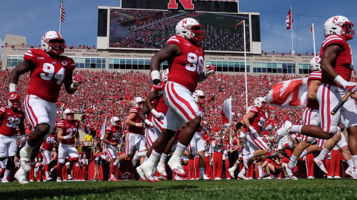 LINCOLN, NE – SEPTEMBER 23: Defensive lineman Khalil Davis #94 of the Nebraska Cornhuskers and defensive lineman Carlos Davis #96 run on the field before the game against the Rutgers Scarlet Knights at Memorial Stadium on September 23, 2017 in Lincoln, Nebraska. (Photo by Steven Branscombe/Getty Images)
