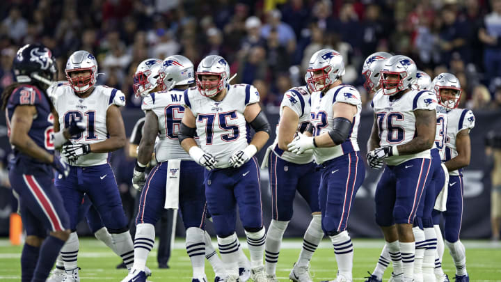 HOUSTON, TX – DECEMBER 1: Offensive line of the New England Patriots breaks the huddle during the first half of a game against the Houston Texans at NRG Stadium on December 1, 2019 in Houston, Texas. The Texans defeated the Patriots 28-22. (Photo by Wesley Hitt/Getty Images)