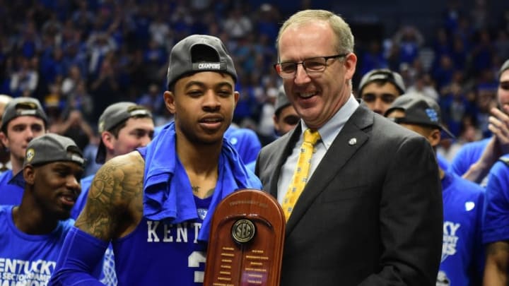 Mar 13, 2016; Nashville, TN, USA; Kentucky Wildcats guard Tyler Ulis (3) is awarded tournament MVP by commissioner Greg Sankey after winnint the championship game of the SEC tournament against the Texas A&M Aggies at Bridgestone Arena. Kentucky won 82-77 in overtime. Mandatory Credit: Christopher Hanewinckel-USA TODAY Sports