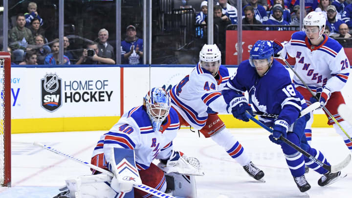 TORONTO, ON – MARCH 23: New York Rangers Goalie Alexandar Georgiev (40) makes a save on Toronto Maple Leafs Left Wing Andreas Johnsson (18) during the regular season NHL game between the New York Rangers and Toronto Maple Leafs on March 23, 2019 at Scotiabank Arena in Toronto, ON. (Photo by Gerry Angus/Icon Sportswire via Getty Images)