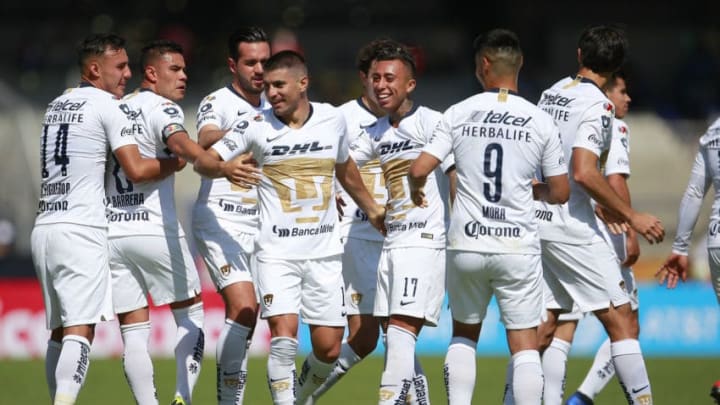 MEXICO CITY, MEXICO - JANUARY 20: Victor Malcorra of Pumas celebrates with teammates after scoring the fist goal of his team during the 3rd round match between Pumas UNAM and Atlas as part of the Torneo Clausura 2019 Liga MX at Olimpico Universitario Stadium on January 20, 2019 in Mexico City, Mexico. (Photo by Mauricio Salas/Jam Media/Getty Images)