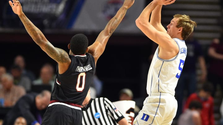 Mar 19, 2017; Greenville, SC, USA; Duke Blue Devils guard Luke Kennard (5) shoots the ball against South Carolina Gamecocks guard Sindarius Thornwell (0) during the first half in the second round of the 2017 NCAA Tournament at Bon Secours Wellness Arena. Mandatory Credit: Bob Donnan-USA TODAY Sports