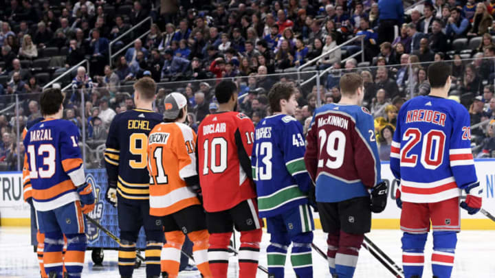 ST LOUIS, MISSOURI - JANUARY 24: (L-R) Mathew Barzal #13 of the New York Islanders, Jack Eichel #9 of the Buffalo Sabres, Travis Konecny #11 of the Philadelphia Flyers, Anthony Duclair #10 of the Ottawa Senators, Quinn Hughes #43 of the Vancouver Canucks, Nathan MacKinnon #29 of the Colorado Avalanche and Chris Kreider #20 of the New York Rangers wait to compete in the Bridgestone NHL Fastest Skater during the 2020 NHL All-Star Skills competition at Enterprise Center on January 24, 2020 in St Louis, Missouri. (Photo by Scott Rovak/NHLI via Getty Images)