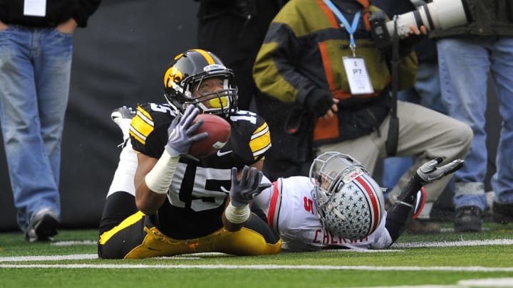 IOWA CITY, IA – NOVEMBER 20: Wide receiver Derrell Johnson-Koulianos #15 pulls in a pass as defensive back Chimdi Chekwa #5 of the Ohio State Buckeyes defends during the first half of play at Kinnick Stadium on November 20, 2010 in Iowa City, Iowa. Ohio won 20-17 over Iowa. (Photo by David Purdy/Getty Images).