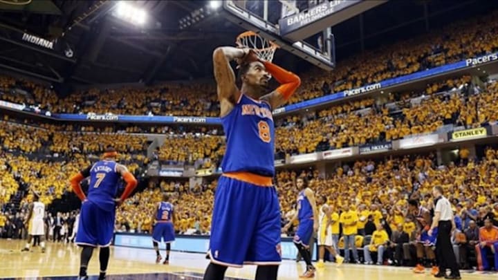 May 18, 2013; Indianapolis, IN, USA; New York Knicks guard J.R. Smith (8) reacts to losing to the Indiana Pacers in game six of the second round of the 2013 NBA Playoffs at Bankers Life Fieldhouse. Indiana defeats New York 106-99. Mandatory Credit: Brian Spurlock-USA TODAY Sports