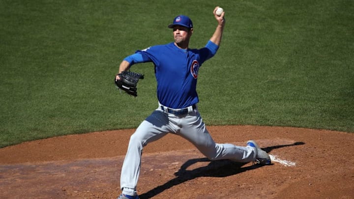 SURPRISE, ARIZONA - FEBRUARY 27: Starting pitcher Cole Hamels #35 of the Chicago Cubs pitches against the Texas Rangers during the second inning of the MLB spring training game against the Texas Rangers at Surprise Stadium on February 27, 2019 in Surprise, Arizona. (Photo by Christian Petersen/Getty Images)