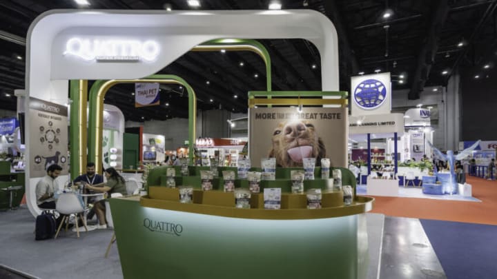BANGKOK, THAILAND - 2023/10/25: The booth of Quattro dog food is seen at Pet Fair South East Asia 2023, at the Bangkok International Trade & Exhibition Centre (BITEC). The second edition of the Pet Fair South East Asia 2023, is for the global pet industry with companies from 40 countries incorporating a fully business-to-business Partnership Hub for Distribution, Retail, and Sourcing, at the Bangkok International Trade & Exhibition Centre (BITEC). (Photo by Nathalie Jamois/SOPA Images/LightRocket via Getty Images)