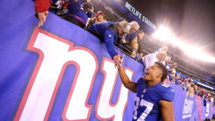 Nov 14, 2016; East Rutherford, NJ, USA; New York Giants wide receiver Sterling Shepard (87) celebrates with fans after defeating the Cincinnati Bengals after a game at MetLife Stadium. Mandatory Credit: Brad Penner-USA TODAY Sports
