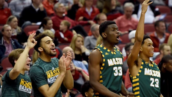 LOUISVILLE, KY - NOVEMBER 12: The George Mason bench celebrates after a Patriots three point shot during the first half of the game between the Louisville Cardinals and the George Mason Patriots at KFC YUM! Center on November 12, 2017 in Louisville, Kentucky. (Photo by Bobby Ellis/Getty Images)