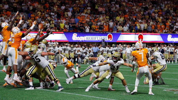 ATLANTA, GA – SEPTEMBER 04: The Tennessee Volunteers defense blocks the go-ahead field goal attempt by Shawn Davis; Photo by Kevin C. Cox, Getty Images