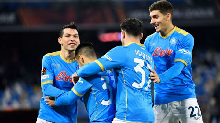 Napoli's Algerian orward Adam Ounas (2ndL) celebrates with Napoli's Mexican forward Hirving Lozano (L) and Napoli's Italian defender Giovanni Di Lorenzo (R) after opening the scoring during the UEFA Europa League Group C football match between Napoli and Leicester on December 9, 2021 at the Diego-Maradona stadium in Naples. (Photo by Alberto PIZZOLI / AFP) (Photo by ALBERTO PIZZOLI/AFP via Getty Images)