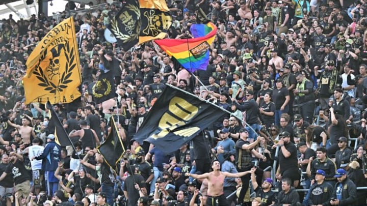 The Pride flag is seen among LAFC fans during the CONCACAF Champions League final leg 2 of 2 match between Los Angeles Football Club and Club Leon at the BMO Stadium in Los Angeles, June 4, 2023. (Photo by Frederic J. BROWN / AFP) (Photo by FREDERIC J. BROWN/AFP via Getty Images)