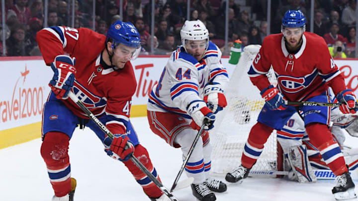MONTREAL, QC - DECEMBER 1: Kenny Agostino #47 of the Montreal Canadiens controls the puck against Neal Pionk #44 of the New York Rangers in the NHL game at the Bell Centre on December 1, 2018 in Montreal, Quebec, Canada. (Photo by Francois Lacasse/NHLI via Getty Images)