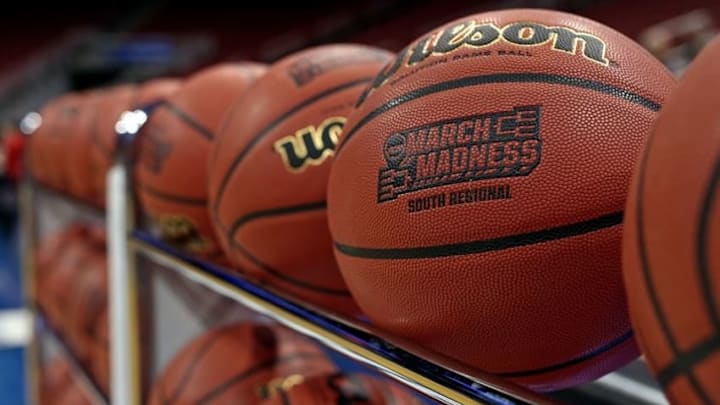 Mar 23, 2016; Louisville, KY, USA; A view of a March Madness logo on a basketball during practice the day before the semifinals of the South regional of the NCAA Tournament at KFC YUM!. Mandatory Credit: Aaron Doster-USA TODAY Sports