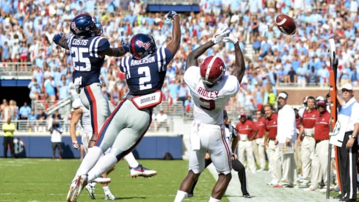 Sep 17, 2016; Oxford, MS, USA; Alabama Crimson Tide wide receiver Calvin Ridley (3) misses a pass as he is defended by Mississippi Rebels defensive back Montrell Custis (25) and defensive back Deontay Anderson (2) during the second quarter of the game at Vaught-Hemingway Stadium. Mandatory Credit: Matt Bush-USA TODAY Sports