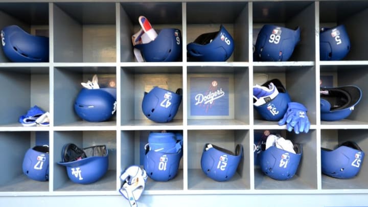 Apr 13, 2016; Los Angeles, CA, USA; General view of Los Angeles Dodgers batting helmets in the dugout during a MLB game against the Arizona Diamondbacks at Dodger Stadium. Mandatory Credit: Kirby Lee-USA TODAY Sports