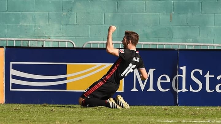 Oct 16, 2016; Washington, DC, USA; D.C. United forward Patrick Mullins (16) celebrates after scoring a goal during the first half against the New York City FC at Robert F. Kennedy Memorial. Mandatory Credit: Tommy Gilligan-USA TODAY Sports