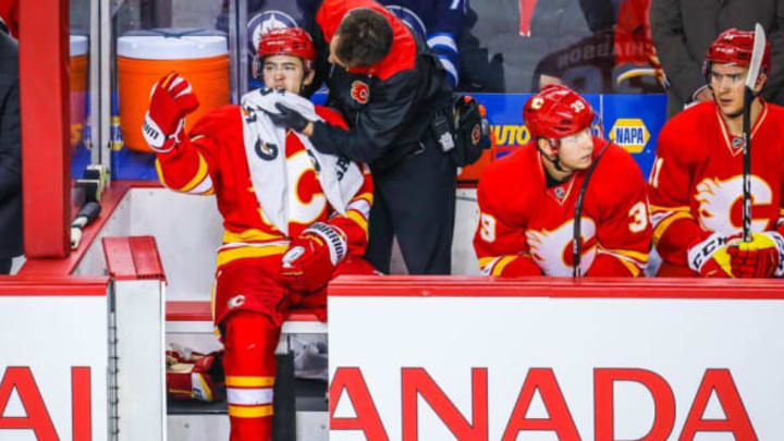 Dec 10, 2016; Calgary, Alberta, CAN; Calgary Flames left wing Johnny Gaudreau (13) on his bench against the Winnipeg Jets during the first period at Scotiabank Saddledome. Mandatory Credit: Sergei Belski-USA TODAY Sports
