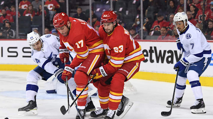 Mar 10, 2022; Calgary, Alberta, CAN; Milan Lucic (17) and forward Sean Monahan. Mandatory Credit: Candice Ward-USA TODAY Sports