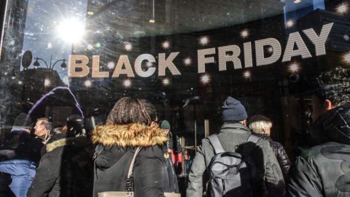NEW YORK, NY - NOVEMBER 23: People shop on Black Friday on November 23, 2018 in New York City. The day after Thanksgiving, Black Friday is considered to be the start of the holiday shopping season, with shoppers heading to stores and online for deals. (Photo by Stephanie Keith/Getty Images)