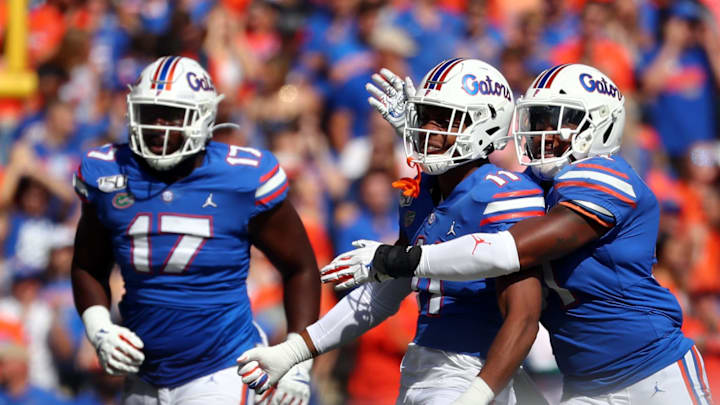 Nov 9, 2019; Gainesville, FL, USA; Florida Gators linebacker Mohamoud Diabate (11) is congratulated by linebacker Ventrell Miller (51) defensive lineman Zachary Carter (17) after a sack against the Vanderbilt Commodores during the first quarter at Ben Hill Griffin Stadium. Mandatory Credit: Kim Klement-USA TODAY Sports