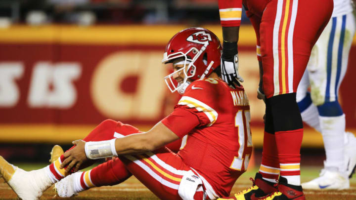 KANSAS CITY, MO - OCTOBER 06: Patrick Mahomes #15 of the Kansas City Chiefs grimaces as he holds his left leg after being hit in the third quarter by the Indianapolis Colts at Arrowhead Stadium on October 6, 2019 in Kansas City, Missouri. (Photo by David Eulitt/Getty Images)