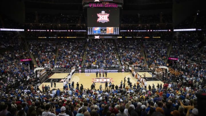 Mar 11, 2023; Kansas City, MO, USA; The Texas Longhorns and Kansas Jayhawks line up for the National Anthem before the first half at T-Mobile Center. Mandatory Credit: Amy Kontras-USA TODAY Sports