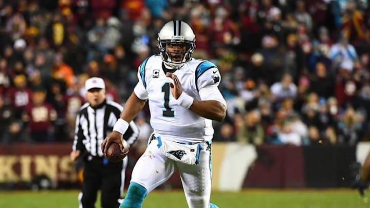 Dec 19, 2016; Landover, MD, USA; Carolina Panthers quarterback Cam Newton (1) scrambles against the Washington Redskins during the first half at FedEx Field. Mandatory Credit: Brad Mills-USA TODAY Sports