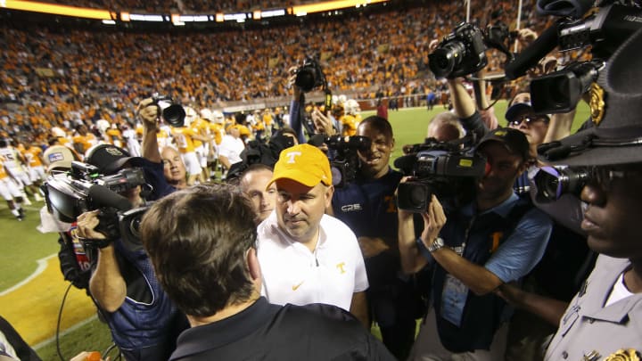 KNOXVILLE, TENNESSEE – OCTOBER 26: Head coach Jeremy Pruitt of the Tennessee Volunteers shakes hands with head coach Will Muschamp of the South Carolina Gamecocks after the game at Neyland Stadium on October 26, 2019 in Knoxville, Tennessee. (Photo by Silas Walker/Getty Images)
