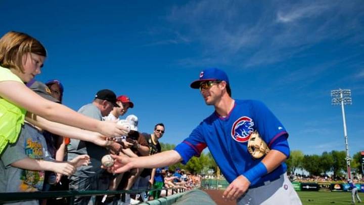 Mar 10, 2014; Scottsdale, AZ, USA; Chicago Cubs third baseman Kris Bryant signs autographs prior to the game against the San Francisco Giants at Scottsdale Stadium. Mandatory Credit: Mark J. Rebilas-USA TODAY Sports