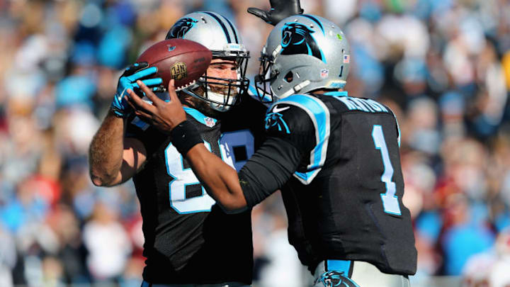 CHARLOTTE, NC - NOVEMBER 22: Greg Olsen #88 and teammate Cam Newton #1 of the Carolina Panthers celebrate a touchdown against the Washington Redskins in the 2nd quarter during their game at Bank of America Stadium on November 22, 2015 in Charlotte, North Carolina. (Photo by Streeter Lecka/Getty Images)
