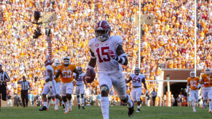 Oct 15, 2016; Knoxville, TN, USA; Alabama Crimson Tide defensive back Ronnie Harrison (15) returns an interception for a touchdown against the Tennessee Volunteers during the first half at Neyland Stadium. Mandatory Credit: Randy Sartin-USA TODAY Sports