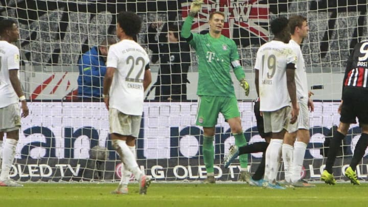 Bayern Munich's German goalkeeper Manuel Neuer (C) and his teammates react after Frankfurt scored the 4-1 during the German first division Bundesliga football match between Eintracht Frankfurt and FC Bayern Munich on November 2, 2019 in Frankfurt am Main, western Germany. (Photo by Daniel ROLAND / AFP) / DFL REGULATIONS PROHIBIT ANY USE OF PHOTOGRAPHS AS IMAGE SEQUENCES AND/OR QUASI-VIDEO (Photo by DANIEL ROLAND/AFP via Getty Images)