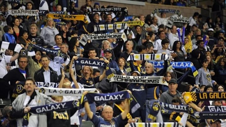 September 21, 2013; Carson, CA, USA; Los Angeles Galaxy fans in attendance cheer against the Seattle Sounders during the first half at StubHub Center. Mandatory Credit: Gary A. Vasquez-USA TODAY Sports
