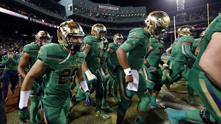 Nov 21, 2015; Boston, MA, USA; The Notre Dame Fighting Irish takes the field to start the second half against the Boston College Eagles at Fenway Park. Mandatory Credit: Greg M. Cooper-USA TODAY Sports