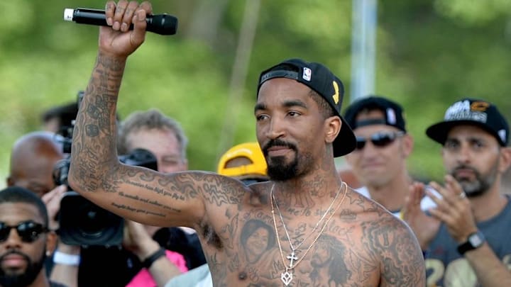 Jun 22, 2016; Cleveland, OH, USA; Cleveland Cavaliers guard J.R. Smith (5) greets the crowd during the Cleveland Cavaliers NBA championship celebration in downtown Cleveland. Mandatory Credit: Ken Blaze-USA TODAY Sports