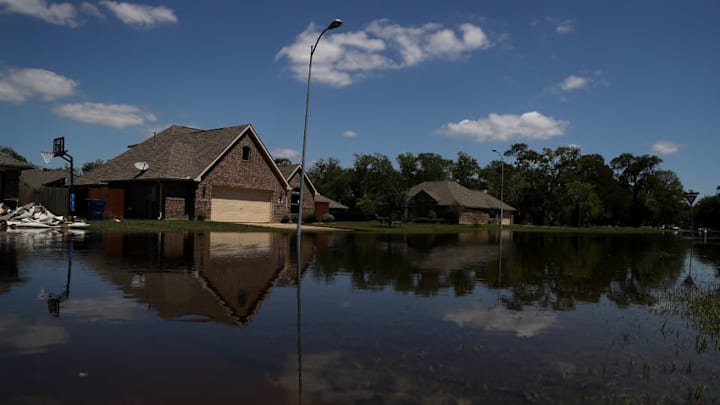 RICHWOOD, TX - SEPTEMBER 07: Floodwaters surround homes on September 7, 2017 in Richwood, Texas. Over a week after Hurricane Harvey hit Southern Texas, residents are beginning the long process of recovering from the storm. (Photo by Justin Sullivan/Getty Images)